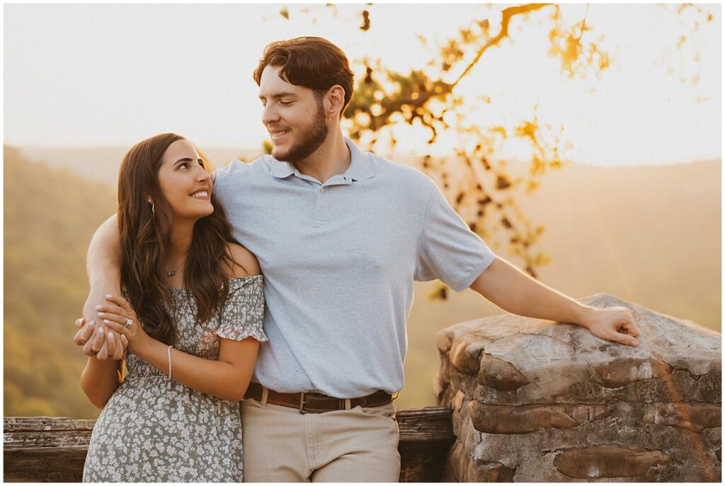 Couple embracing as they look into each others eyes