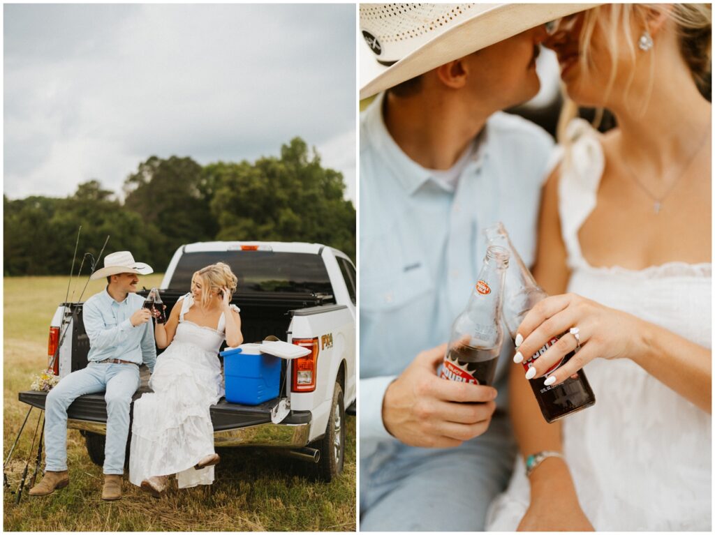 couple sitting in on back of pickup truck sipping a bottle of soda